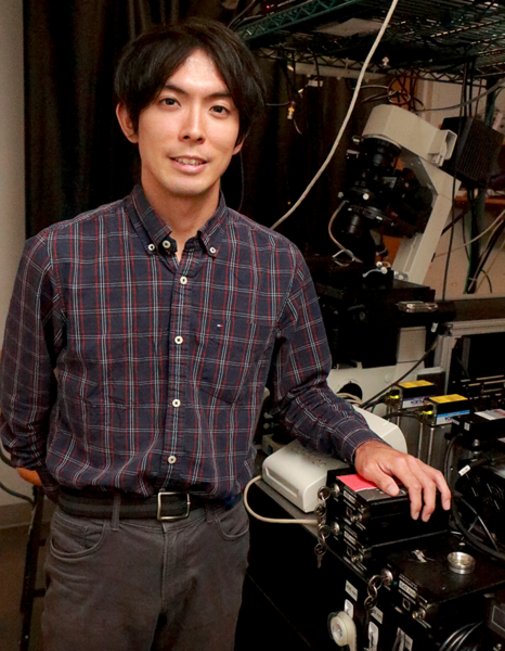 Department of Physics graduate student Takuma Inoue built the super-resolution microscopy set up in the Cissé lab at MIT to study single molecule behavior of enzyme clusters that enable gene copying and protein production within living cells. On the table, five different lasers excite different fluorescent proteins at different wavelengths and image their location.