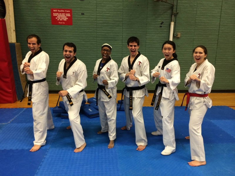 Six members of the MIT Sport Taekwondo Club in fighter pose