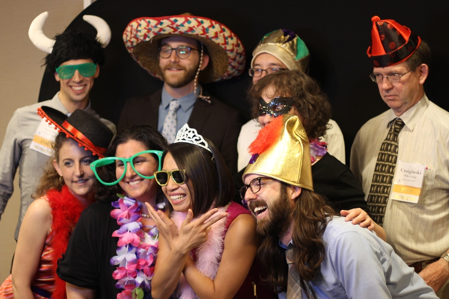 MITES instructors pose in the photo booth at the MITES 40th Anniversary Launch Party. Instructors pictured are (clockwise from top left): Aaron Ewall-Wice, Joe Steinmeyer, Christopher Brunner, Mary Caulfield, Michael Craig, Ryan Marnane, Lynn Kee, Jamie Lichtenstein, and Marlene Kuhn.