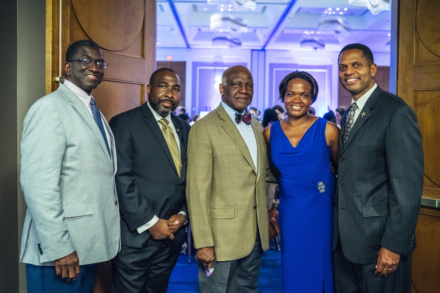 Left to right: Corning representative Gregory Williams, former OEOP Executive Director Dedric Carter, MIT Professor Wesley L. Harris, current OEOP Executive Director Shawna Young, and former MITES Director Karl Reid pose for a photo at the MITES 40th Anniversary Launch Party.
