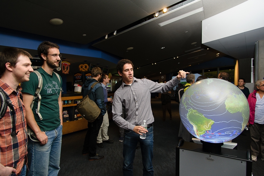 EAPS graduate student Vince Agard demonstrates the iGlobe.