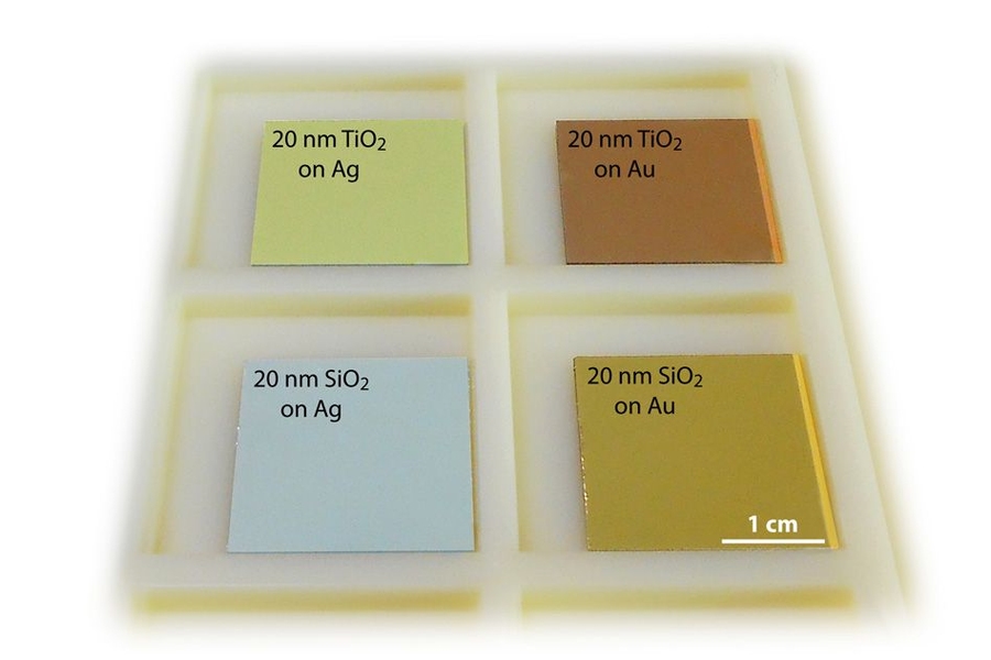Remarkable color changes occur when different thin films of oxides (low dielectric-index SiO2 and high dielectric-index TiO2) are deposited onto the noble metals silver (Ag) and gold (Au). The color change is due to light absorption via surface plasmons, which are strongly enhanced by the quantum spillover effect at the interface of a noble metal and a high-index dielectric.
