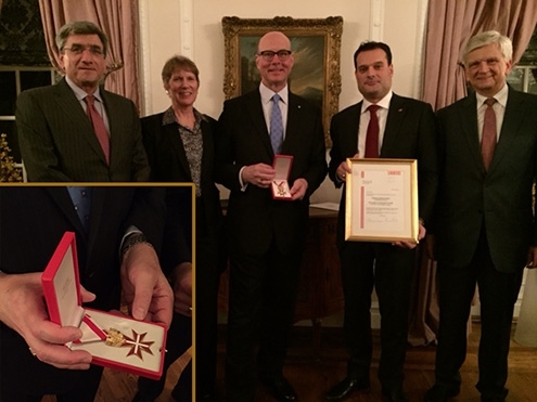 Randall Wright (center), senior industrial liaison officer at the MIT Industrial Liaison Program (ILP), received the Austrian Decoration of Honor on Oct. 6. With him are (l-r) Karl Koster, executive director of ILP; Marilyn Wright, Randall's wife; Michael Friedl, Austrian trade commissioner for the U.S.; and Hans Peter Manz, Austrian ambassador to the U.S.
