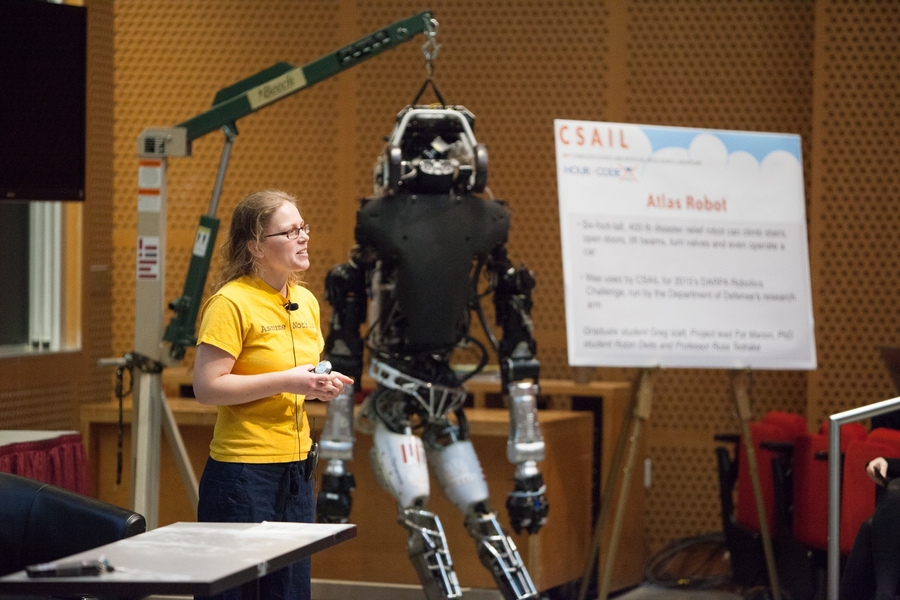 With CSAIL's Atlas robot in the background, PhD candidate Elena Glassman talks about how she first got interested in coding.