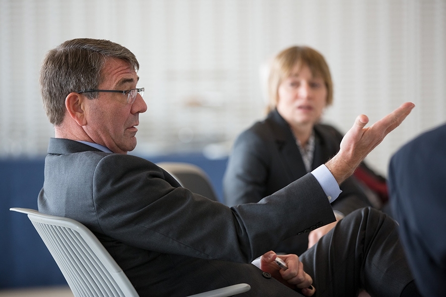 Photo of Ash Carter and Maria Zuber sitting at a conference table