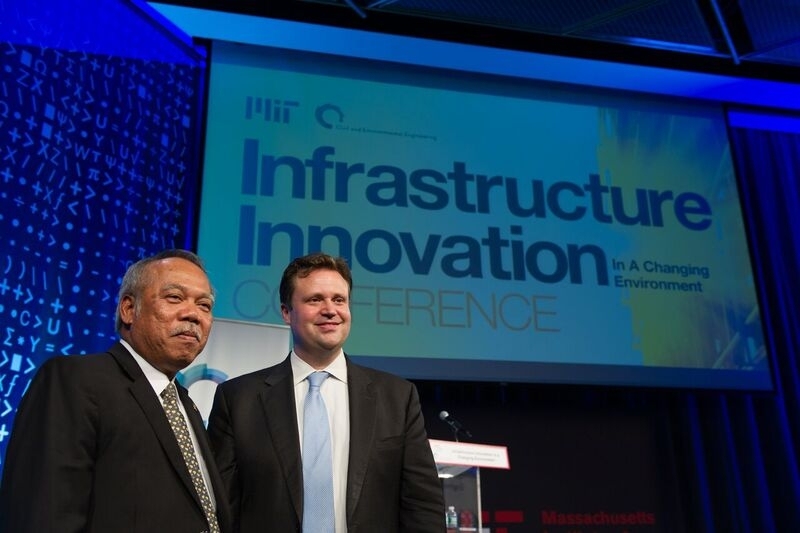 The Republic of Indonesia’s Minister of Public Works Basuki Hadimoeljono meets after his talk with Professor Markus Buehler, conference chair and head of the MIT Department of Civil and Environmental Engineering.