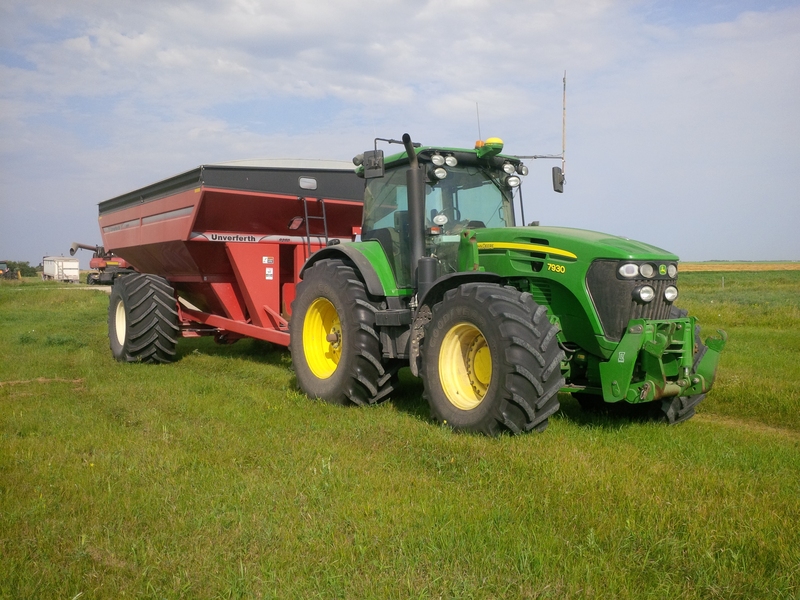 During the recent harvest, Reimer's driverless tractor unloaded grain from a combine over 500 times.