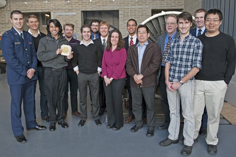 Members of MIT’s REXIS team, with Rebecca Masterson, center.