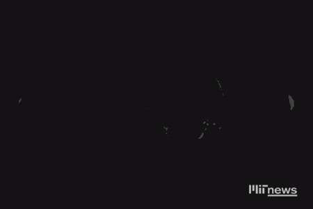 A sheet of PDMS is inflated, allowing us to see the MIT Logo placed underneath the PDMS. (View full screen to watch animation.)