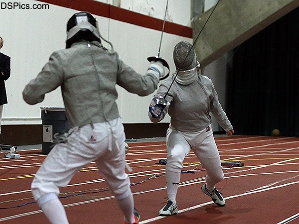 Senior Madison Douglas (right) compiled a 12-3 record in sabre at the Eric Sollee Invitational, helping the MIT women's fencing team to a 4-1 mark at the competition.
