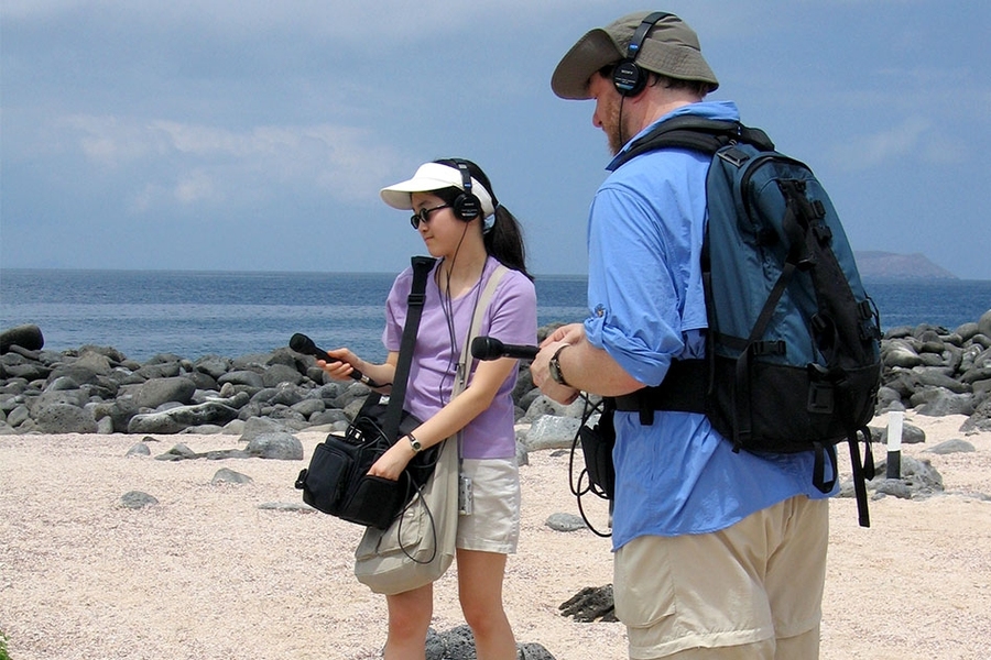 Lisa Song ’08 SM ‘09 (left) recorded for Terrascope Radio in the Galapagos Islands — one of her first experiences in journalism.
