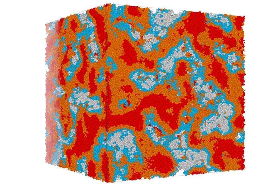 This image of a simulated concrete sample shows the "packing fraction" which describes the fraction of the volume that is filled with solid material. In this case, the average packing fraction is 0.52. Colors indicate the variations within the sample, ranging from less than 0.4 to more than 0.64. The size of the cube is 0.6 microns (millionths of a meter). 