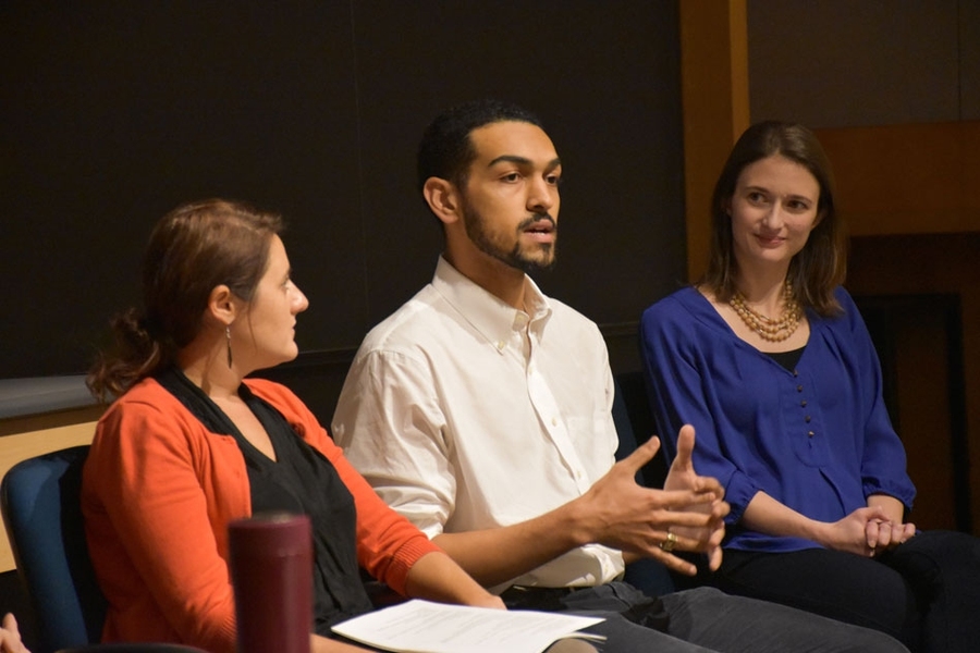 MIT physics and political science undergraduate Joseff Kolman (center) speaks about attending the COP21 conference.