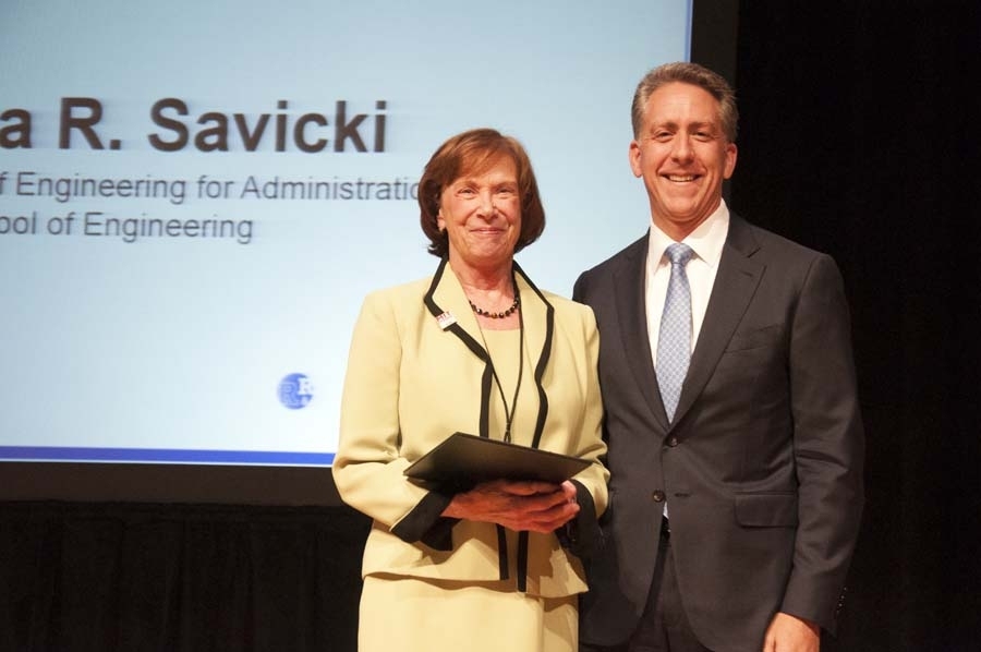Donna Savicki, a recipient in the Bringing out the Best award category, poses with Ian Waitz, dean of the School of Engineering.