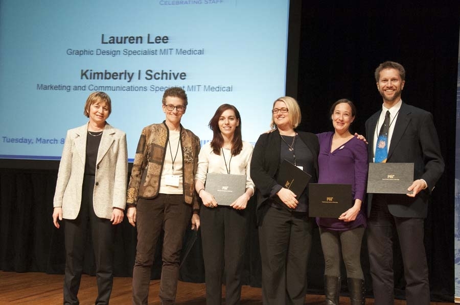 Vice President for Research Maria Zuber presents the MIT Medical Website Redesign Team with an award for Serving the Client.
