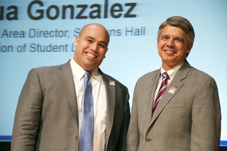 Joshua Gonzalez (left), a recipient in the Outstanding Contributor award category, poses with Eric Evans, director of MIT Lincoln Laboratory.