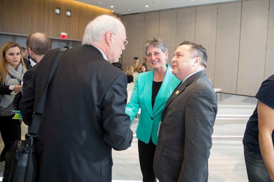 Biotech pioneer and Institute Professor Phillip Sharp (left), who delivered the keynote address at the KSA annual meeting, said Kendall Square has “grown out of a collaboration between community, university, and the financial community to make a tremendously innovation sector." Picture here, Sharp speaks with Gallop and and Cambridge Vice Mayor Marc McGovern (right).