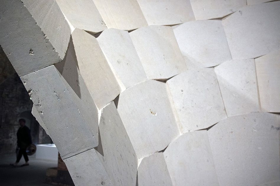 The vault is made from hundreds of limestone tiles supported only by compression: No adhesives, pins, or other fasteners hold the tiles together.