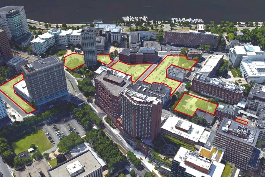 The site of the new buildings, renovated historical structures, and newly created green spaces will span what is now a string of MIT-owned parking lots.
