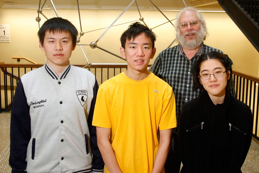 (Left to right) freshman Yunkun Zhou, junior Bobby Shen, mathematics professor Peter Shor, and freshman Danielle Wang.