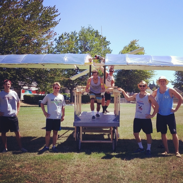 The 2015 MIT Flugtag team posed with the glider they built for the competition in Portland, Oregon. Unfortunately, an overabundance of spectator boats on the Willamette River caused the Coast Guard to shut down the event before the team’s turn to fly.