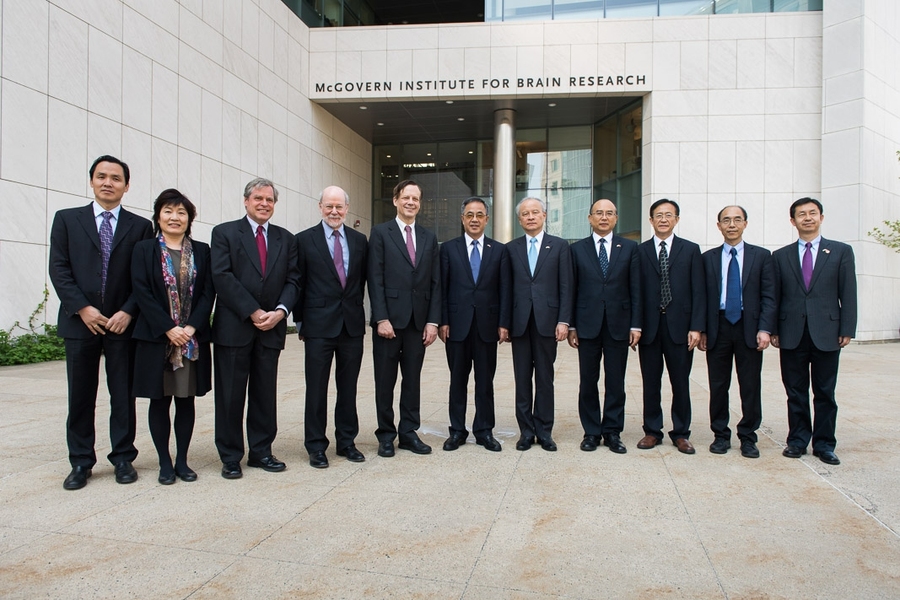 MIT's McGovern Institute for Brain Research hosted a visiting delegation from China, headed by the secretary of Guangdong Province, Hu Chunhua (sixth from left) and also including the mayor of Shenzhen, Xu Qin (fourth from right); the Chinese ambassador to the U.S., Cui Tiankai (fifth from right); the consul-general to New York, Zhang Qiyue (second from left); and SIAT Director Fan Jianping (third...