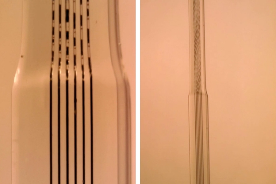 These micrographs show the fibers embedded in polymer and demonstrate how the fibers break apart into segments when they are stretched out in the cold-drawing process.