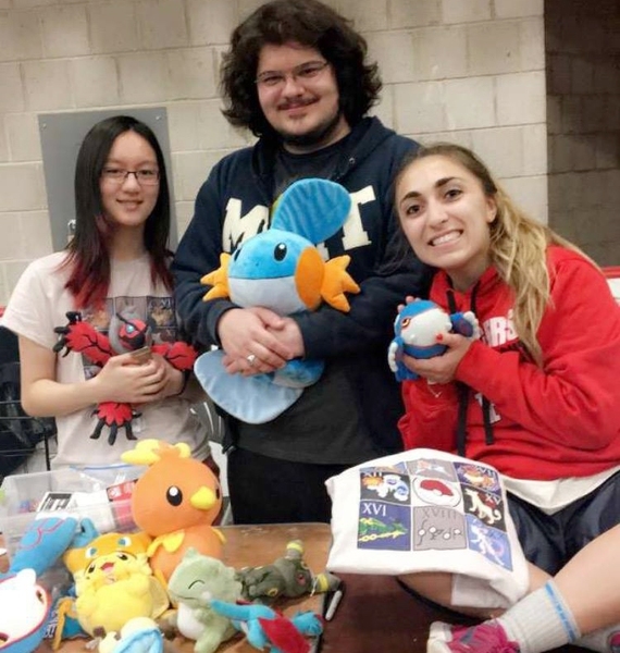 Lucy Yang (left) and two fellow MIT Pokemon League officers recruited students at this spring's Campus Preview Weekend.