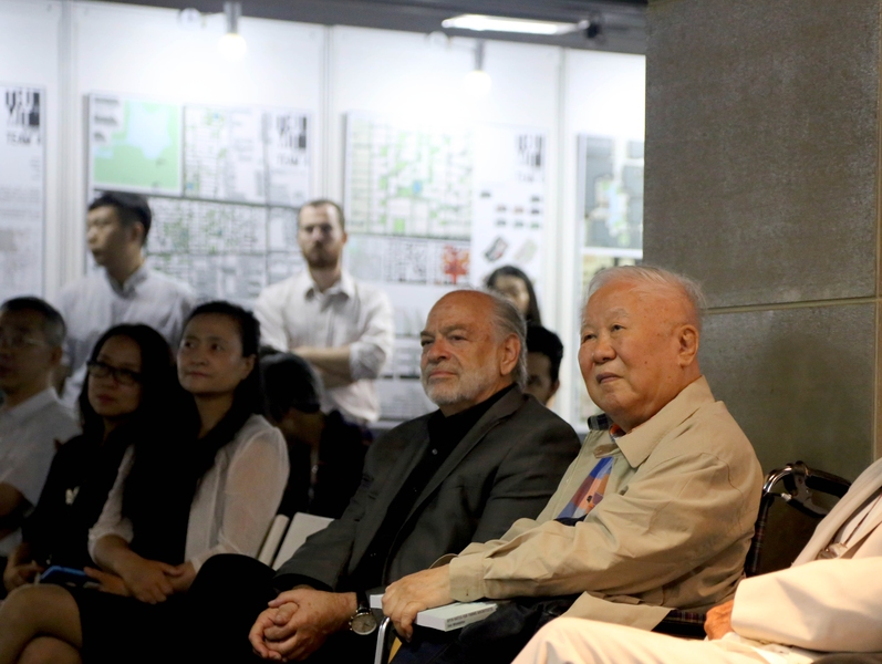 Longtime collaborators: MIT professor Dennis Frenchman (center) sits with Professor Wu Liangyong (right) of Tsinghua University during the celebration of the program anniversary. Wu was a founder of the studio in 1985, and Frenchman has played a central role since 1987.