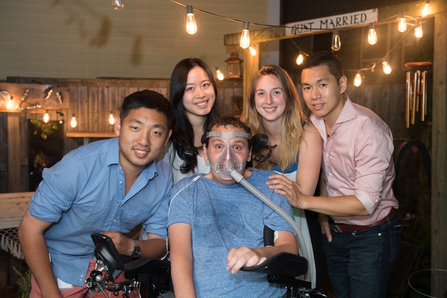 After hours working on the startup technology, David Cipoletta (far left), Wenxin Feng, Casey Forster, and Dexter Ang gather for a photograph with Bobby Forster.