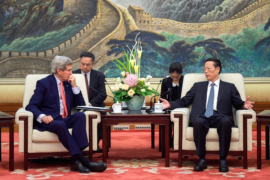 Vice Premier of China Zhang Gaoli (seated, right), whose portfolio includes environmental issues, speaks with U.S. Secretary of State John Kerry at the outset of a meeting about climate change and other topics at the Great Hall of the People in Beijing, China, on Nov. 11, 2014. 