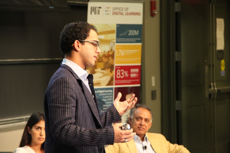 Nafez Dakkak, founding director of Edraak.org, speaks as Hila Azadzoy (left), head of academics at Kiron University, and Ramji Raghavan, founder and chair of Agastya International Foundation, look on.