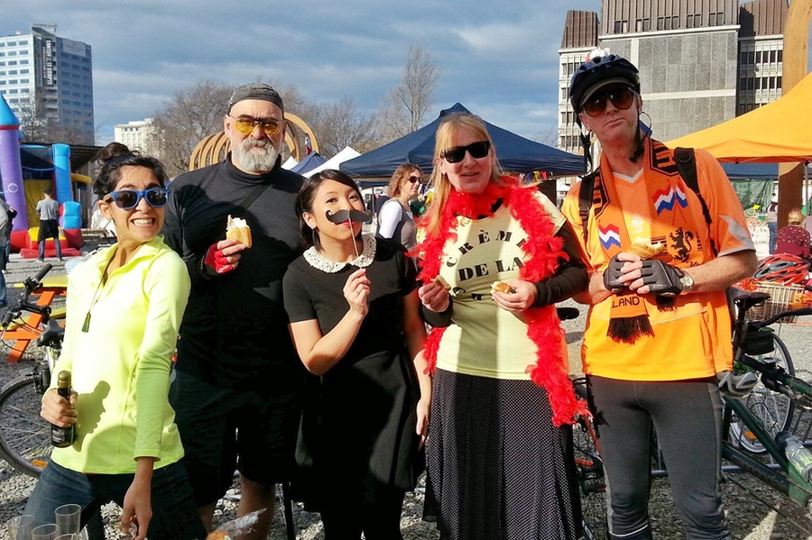 Lily Bui (center) poses at a GPS painting event in Christchurch, New Zealand.