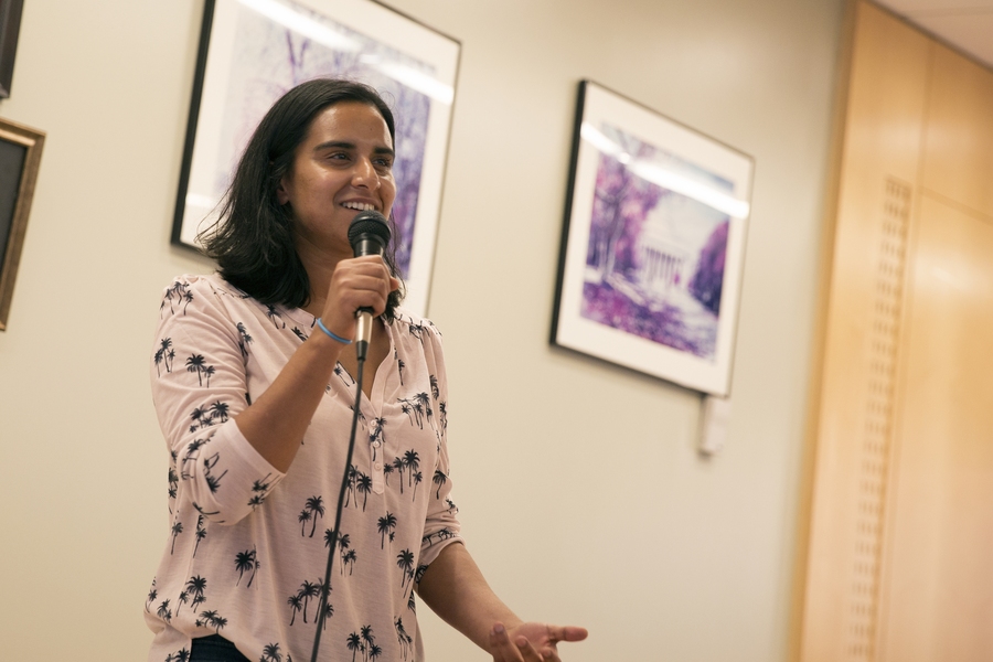 Malvika Verma, MIT PhD candidate and "Failures in Graduate School" organizer, introduces Professor Robert Langer.