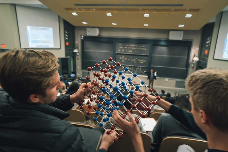 You’ll often see 3-D atomic models bobbing along the aisles in Grossman’s 3.091 course as nearly 400 students take a look for themselves. He believes creating a physical connection with intellectual concepts enhances student learning.