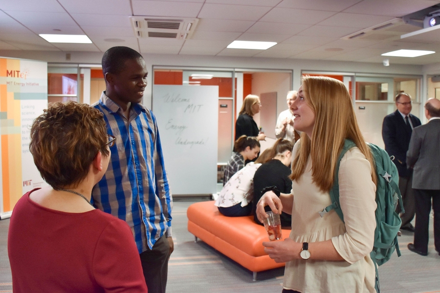 Academic Coordinator Ann Greaney-Williams (left) speaks with freshman Emmanuel Havugimana (center) and sophomore Rebecca Eisenach, who is vice president of the Undergraduate Energy Club, at the MITEI Undergraduate Energy Commons opening.