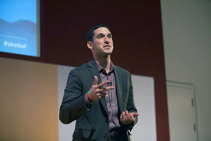 Noam Angrist presenting at the Skoll World Forum.