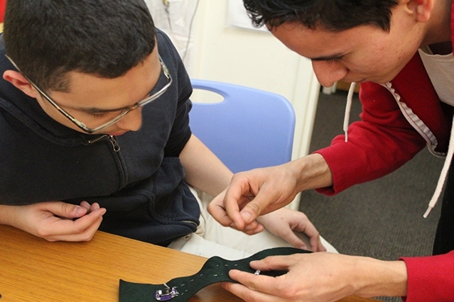 A JV InvenTeam student learns how to create electronic textiles.