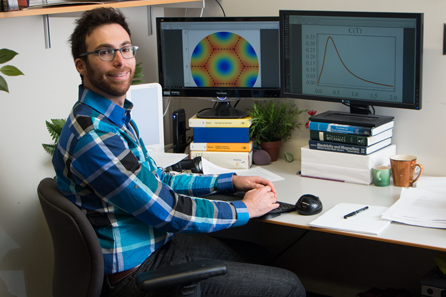 MIT Pappalardo Fellow in physics Itamar Kimchi studies unusual behavior of electrons in transition metal oxides. Frustration of electrons in some materials at extremely low temperatures can force them to abandon their preference for classical magnetic states and instead enter unusual states of collective quantum superposition.
