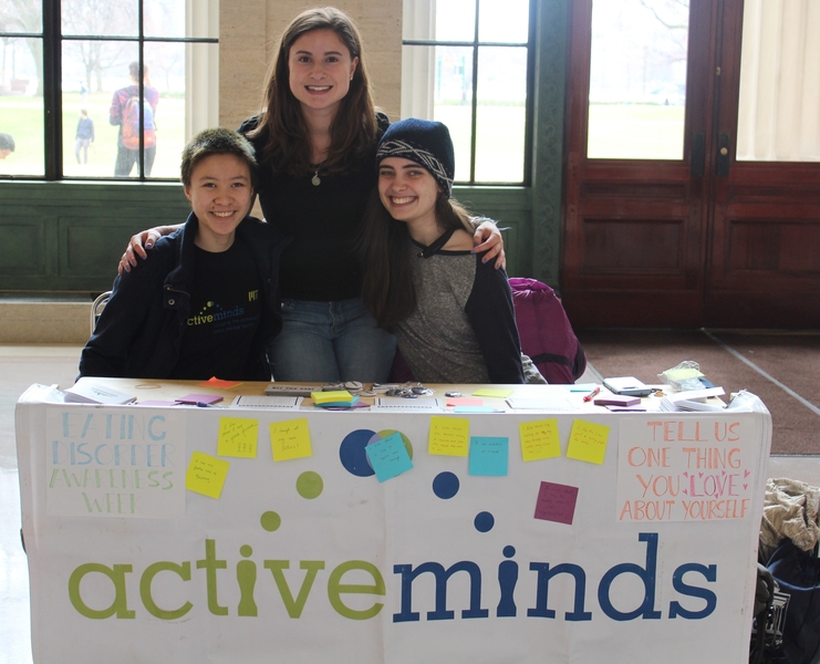 Left to right: Seniors Lorraine Wong, Kathy Dieppa, and Zoë Redstone-Rothstein staff the Active Minds booth during Eating Disorder Awareness week in March.