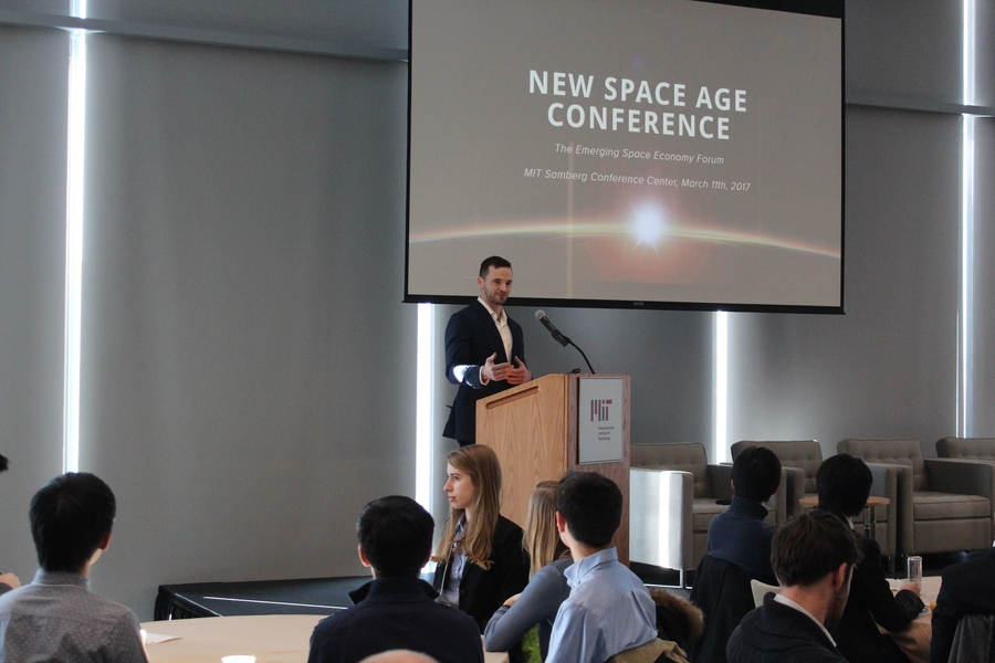 Barret Schlegelmilch, president of the student-run MIT Sloan Astropreneurship and Space Industry Club, which hosted the conference, delivers opening remarks.
