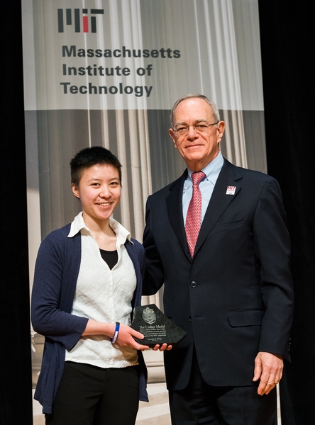 Lorraine Wong receives the 2017 Collier Medal from MIT President L. Rafael Reif.