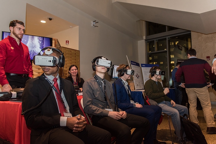 At the Friday evening “Energy Showcase,” participants tried out a virtual reality demonstration put on by Shell, one of the conference sponsors.