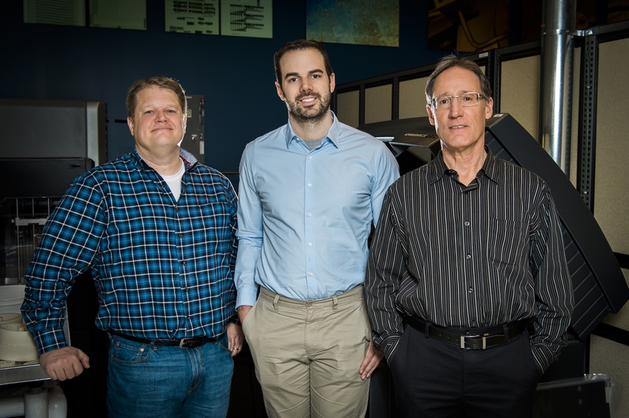Two of the coauthors of an article exploring the feasibility of fabricating microfluidic devices in makerspaces, Peter Carr and David Walsh (at left and center), worked with David Scott (right), manager of Lincoln Laboratory's makerspace, the Technology Office Innovation Laboratory, to create a variety of functional devices. Not pictured: Coauthors David Kong and Shashi Murthy.