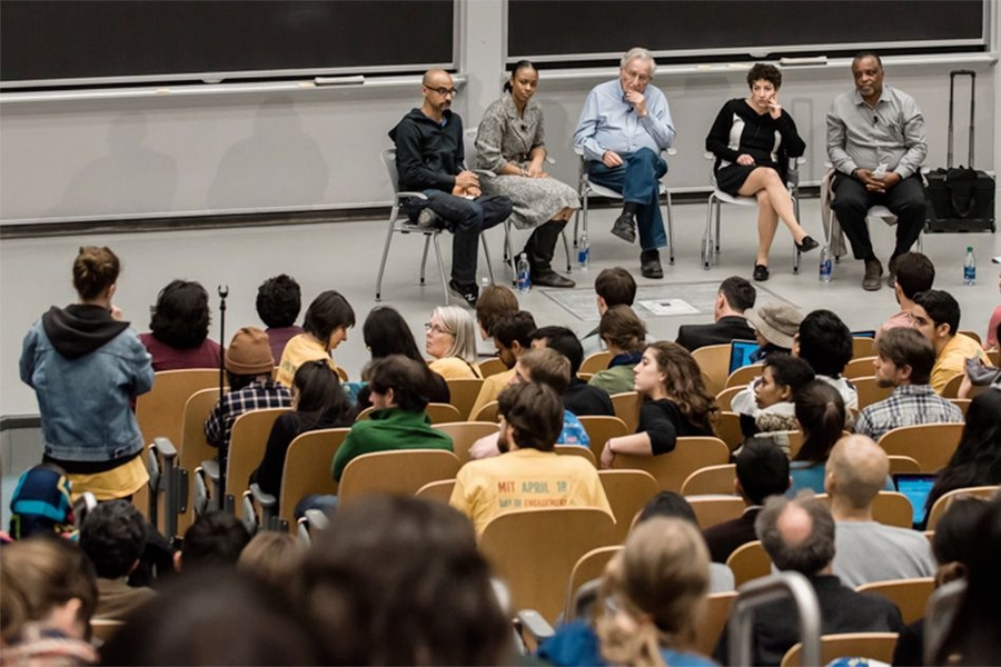 A panel discussion on intellectual responsibility at the MIT Day of Action. From left: Junot Díaz, the Rudge and Nancy Allen Professor of Writing at MIT; Saida Grundy, an assistant professor of sociology and African American studies at Boston University; MIT Institute professor Noam Chomsky; Naomi Orestes, a professor of the history of science at Harvard University; and J. Phillip Thompson, an a...