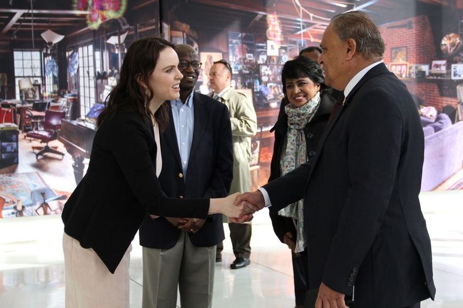 Julia Reynolds-Cuellar, managing director for the MIT-Africa Initiative (left), greets Sooroojdev Phokeer, the Mauritius ambassador to the U.S. (right), on April 7. In the background are Julius Akinyemi, entrepreneur-in-residence at the MIT Media Lab (center-left), and Ameenah Gurib-Fakim, the president of Mauritius (center-right).