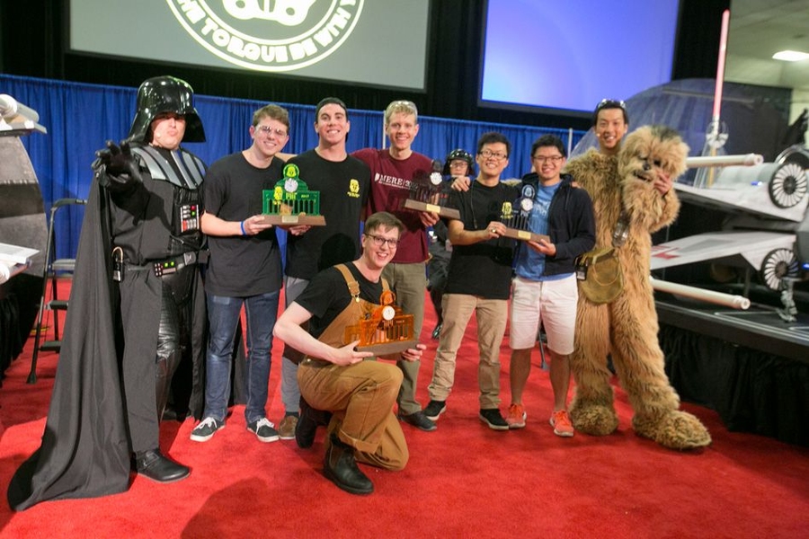 Left to right: Professor Amos Winter (as Darth Vader); Joshua Graves; 3rd place finisher Brandon McKenzie; 1st place winner Tom Frejowski (kneeling); 2nd place finisher Richerd Moyer; 4th place finisher ZhiYi Liang; Gabriel Li; and Professor Sangbae Kim (as Chewbacca).