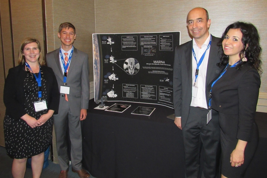Left to right: Caitlin Mueller (faculty advisor), Matthew Moraguez, George Lordos, and Valentina Sumini are some of the members of the interdisciplinary MIT team that won first place in the graduate division of the Revolutionary Aerospace Systems Concepts-Academic Linkage Design Competition Forum.