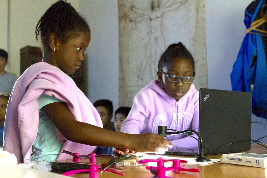 During CEE Kids Camp, kids used an optical microscope to explore the intricate details of various natural materials and structures to learn about bioinspired materials.