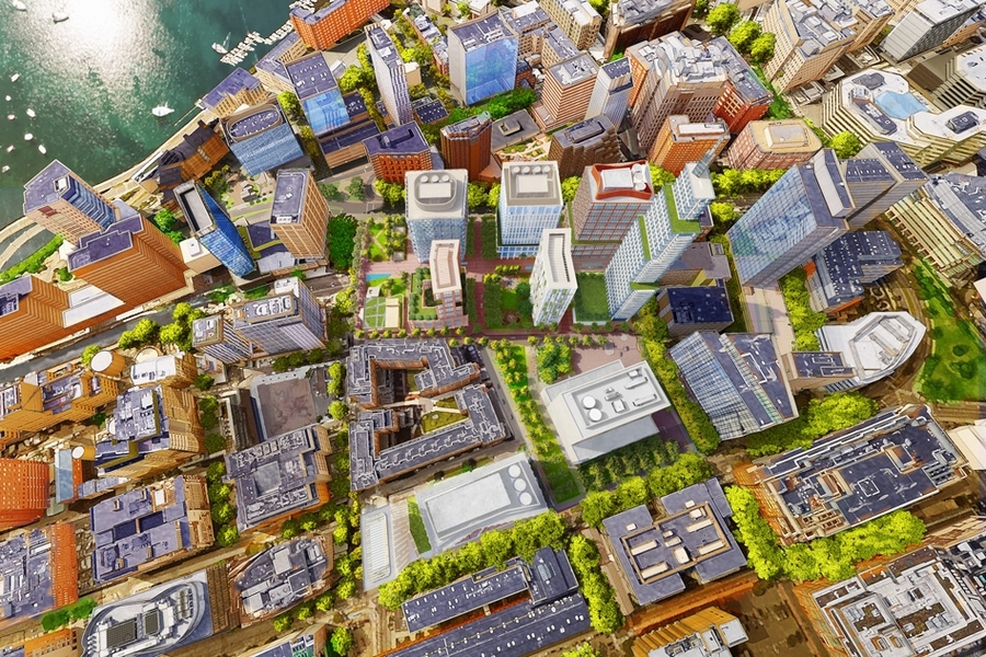 The site viewed from above, in an example site plan, showing open spaces, a conceptual massing for the Volpe facility, and conceptual massing and materials for the development.